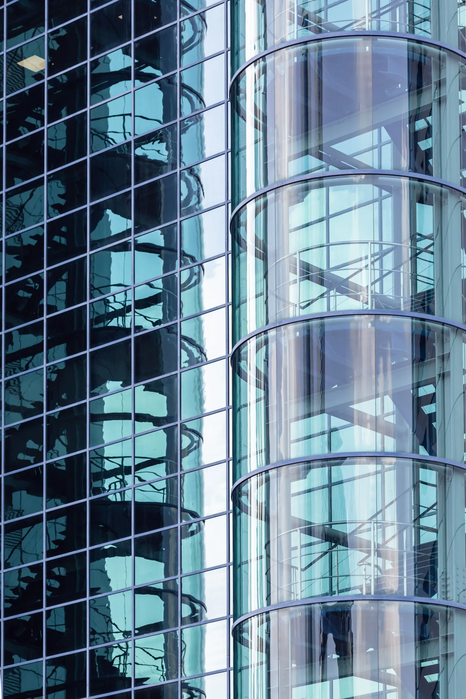 Reflective glass facade of an office building in Dubai
